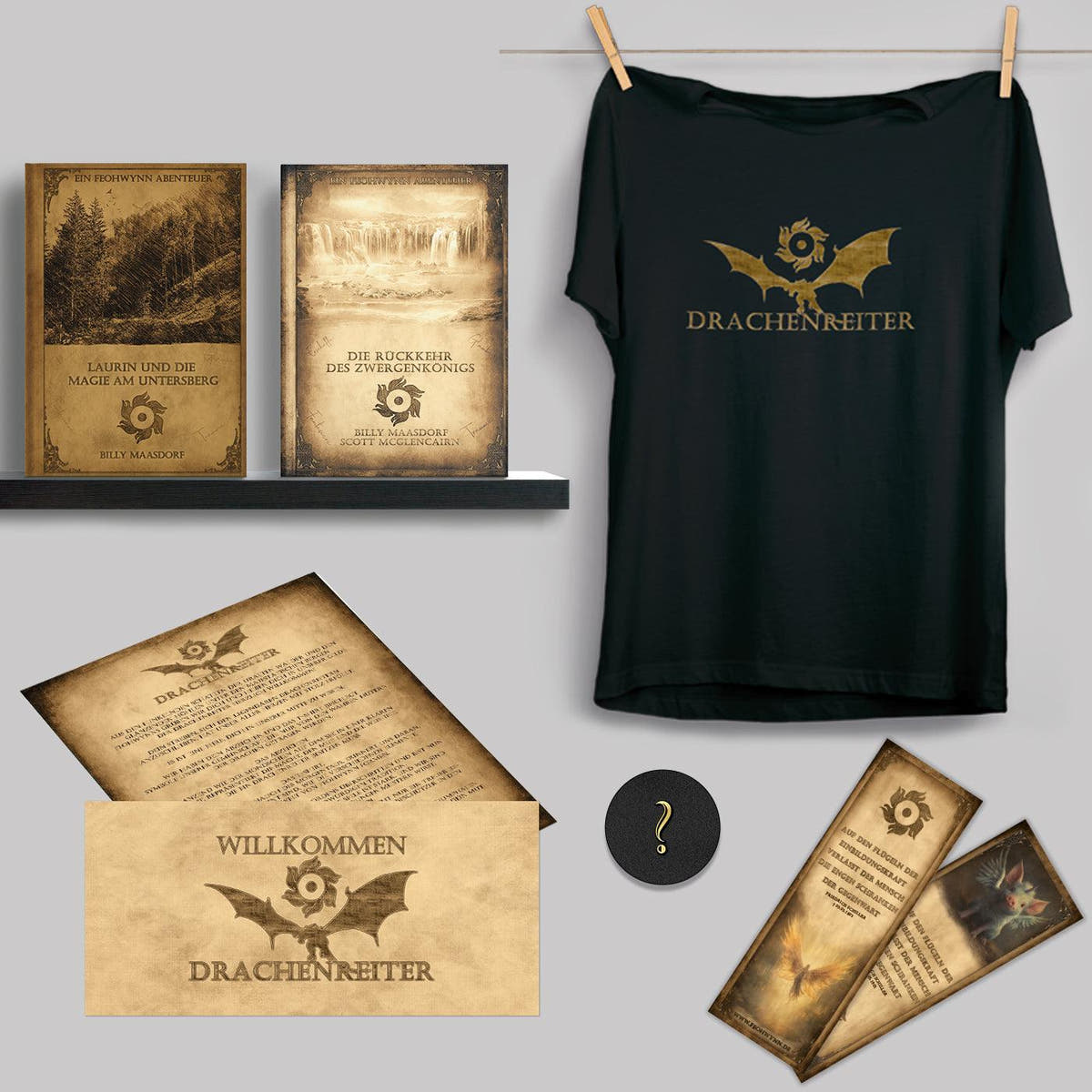 Lieferumfang der Drachenreiter-Edition mit zwei Büchern, schwarzem T-Shirt, Lesezeichen und Begleitschreiben